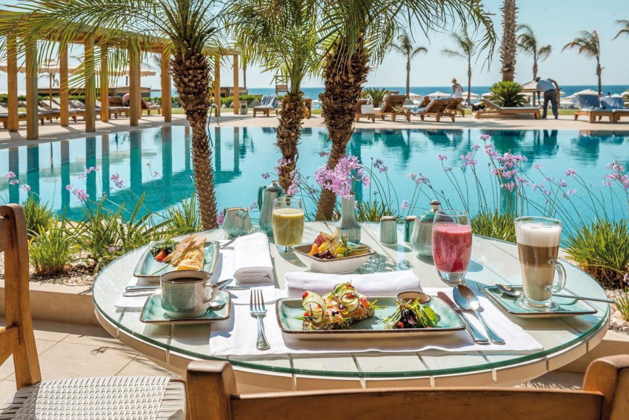 Готель Mitsis Selection Alila Фаліракі Екстер'єр фото Poolside dining at the Four Seasons Hotel, Tel Aviv
